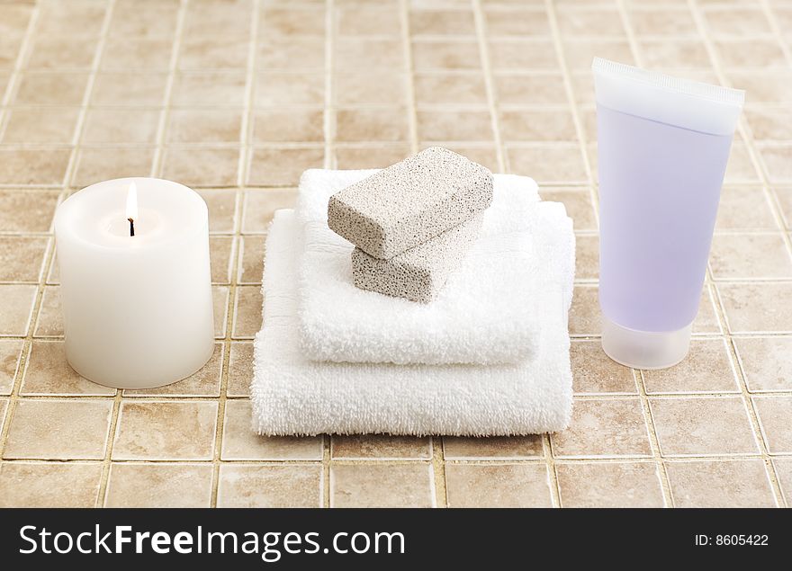 Spa display against a stone tile backdrop.