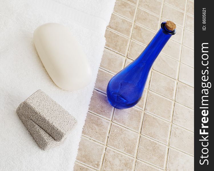 Spa display against a stone tile backdrop.