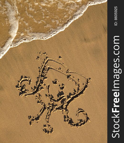 Design of an octopus on the sand. Design of an octopus on the sand