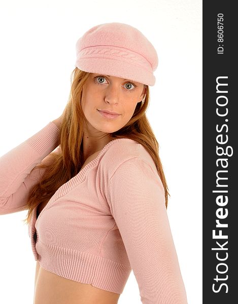 Young woman posing, wearing sexy clothes and a cap. Young woman posing, wearing sexy clothes and a cap.