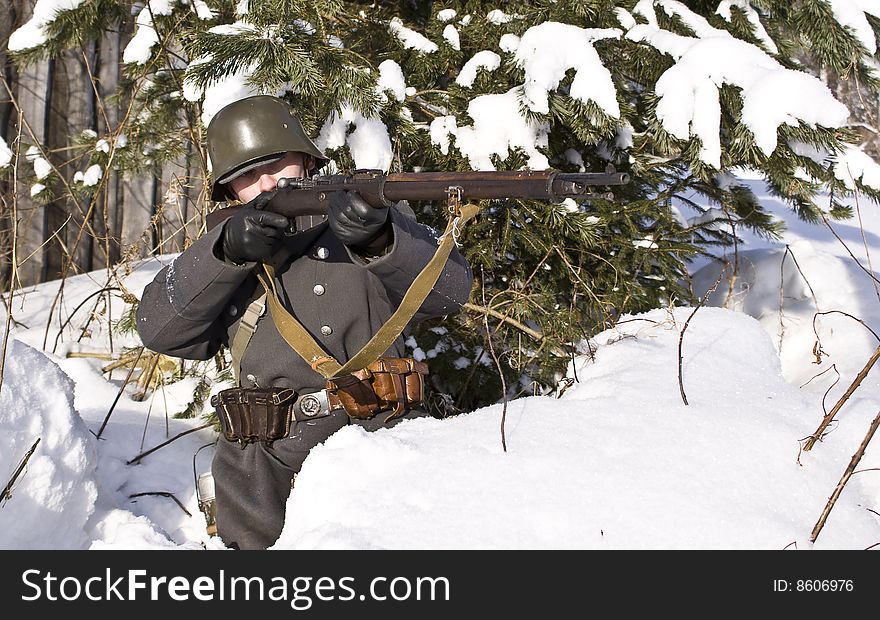 Finnish Soldier Aims From A Rifle