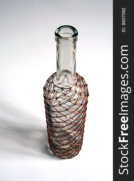 Glass bottle with the nice wire pattern. Glass bottle with the nice wire pattern