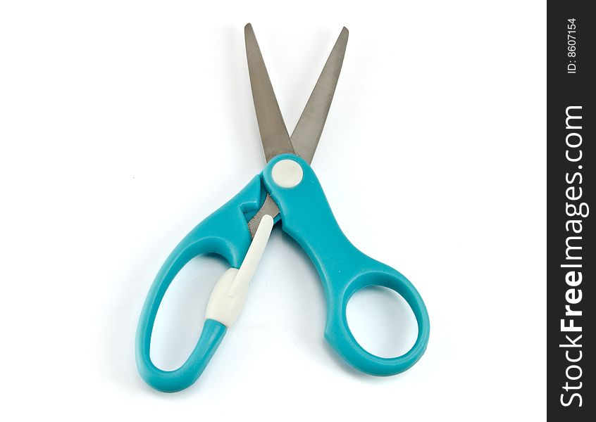 Scissors on the white background