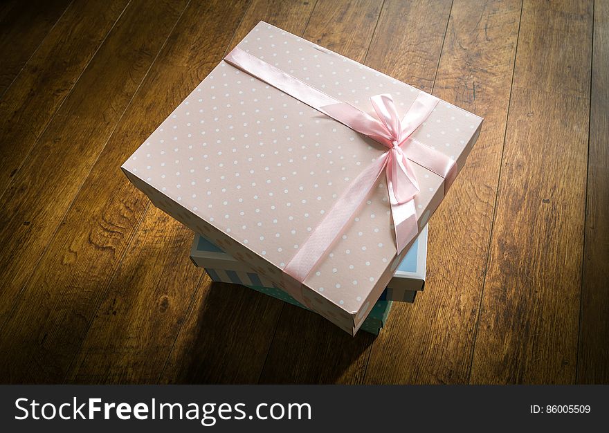 Colorful Gift Boxes On Wooden Floor