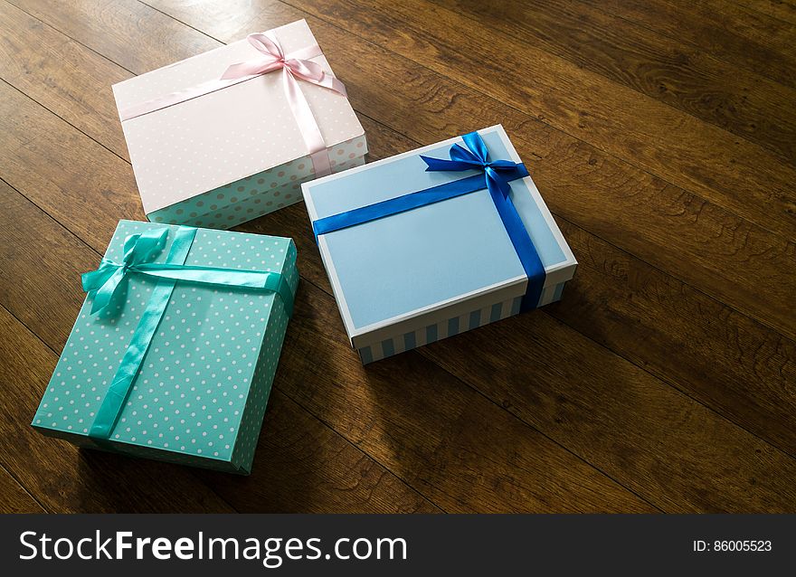 Colorful Gift Boxes On Wooden Floor