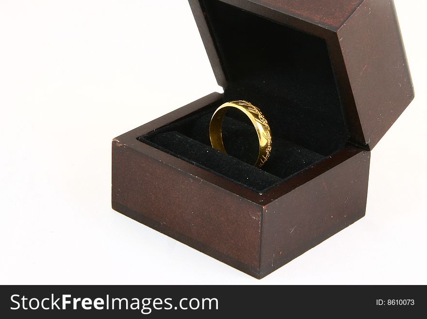Gold ring in a wood box
