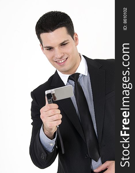 Businessman taking pictures with cellular phone. Businessman taking pictures with cellular phone