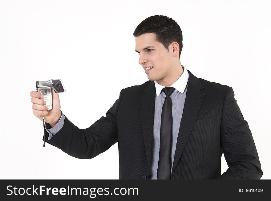 Businessman taking pictures with cellular phone. Businessman taking pictures with cellular phone