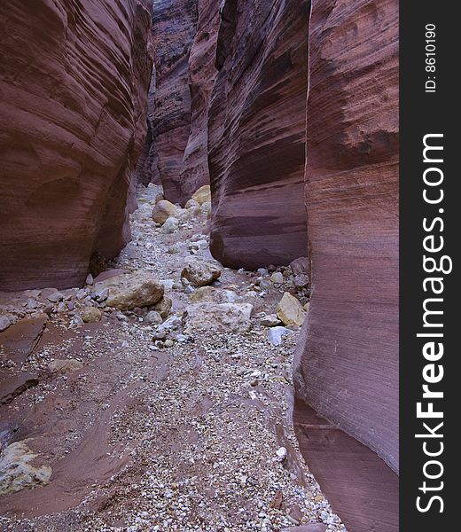 A base of gravel and small boulders in Buckskin Gulch, Utah