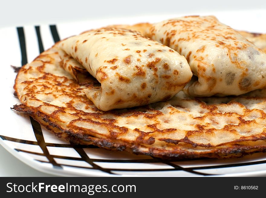 Delicious fresh pancakes on a dish