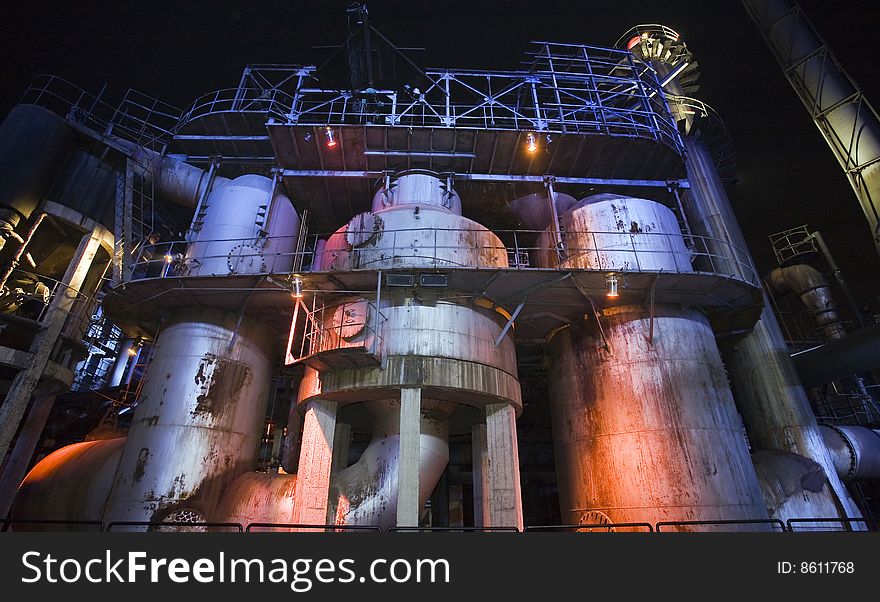 Piping and machinery at industrial processing plant.