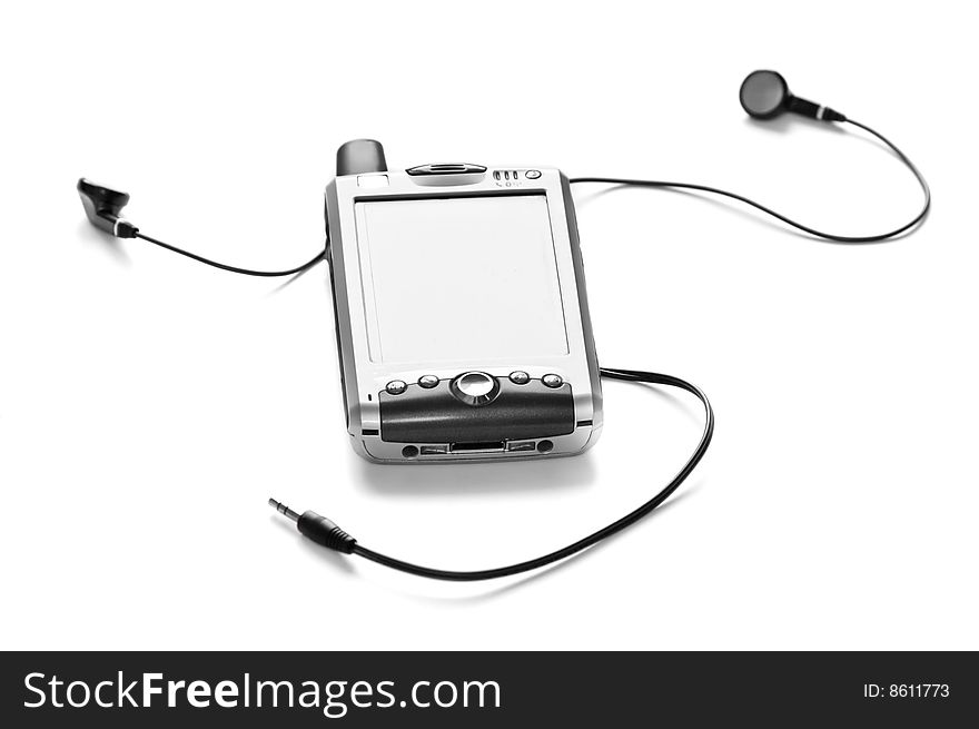 PDA phone with headphones, isolated on white. Narrow DOF with focus on the front of the PDA. PDA phone with headphones, isolated on white. Narrow DOF with focus on the front of the PDA