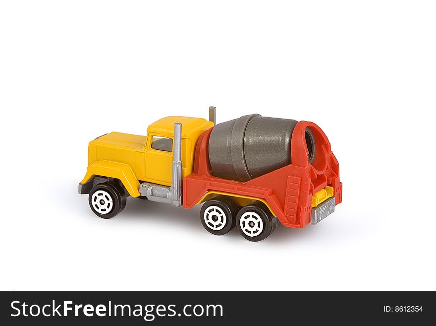 Miniature toy concrete mixer truck. Isolated on white. Miniature toy concrete mixer truck. Isolated on white.