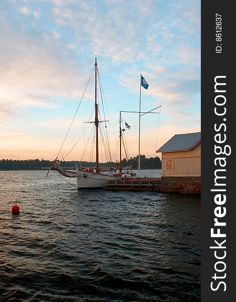 Classic wooden sail yacht moring to pier in Tamisaaree, Finland. Classic wooden sail yacht moring to pier in Tamisaaree, Finland