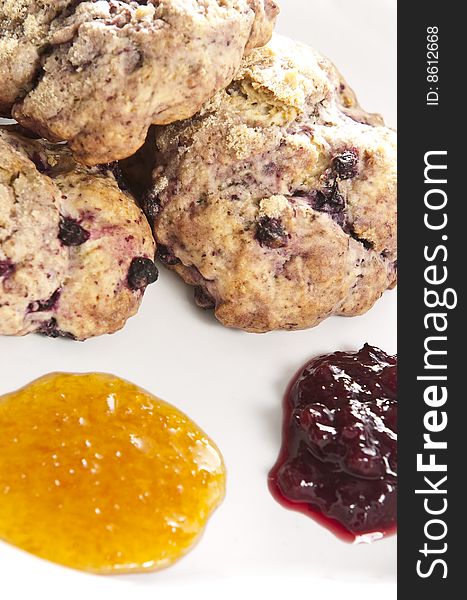 Blueberry scones with orange and red jam