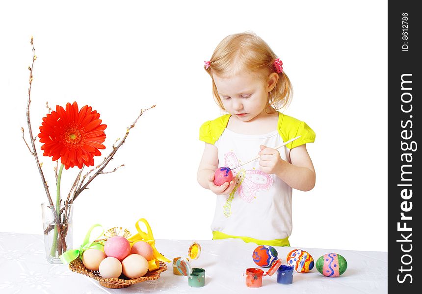 Girl with easter egg isolated on white