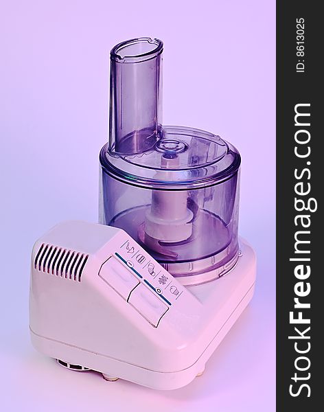 Electric mincing machine on color background