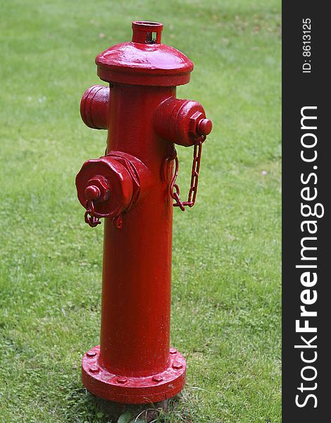 A nice looking bright red fire hydrant.