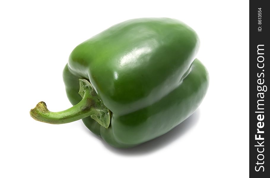 Fresh green pepper isolated on white background with shadows