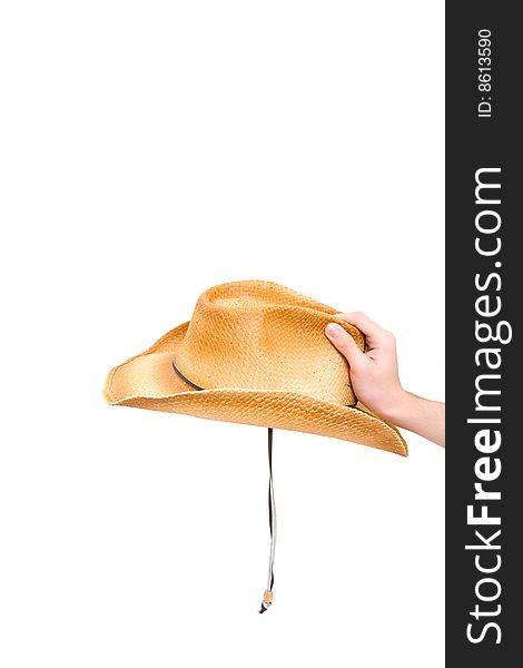 Hand holding hat on white background