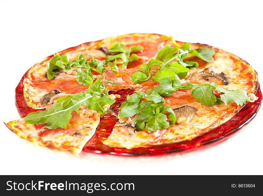 Sliced tasty pizza. Isolated over white