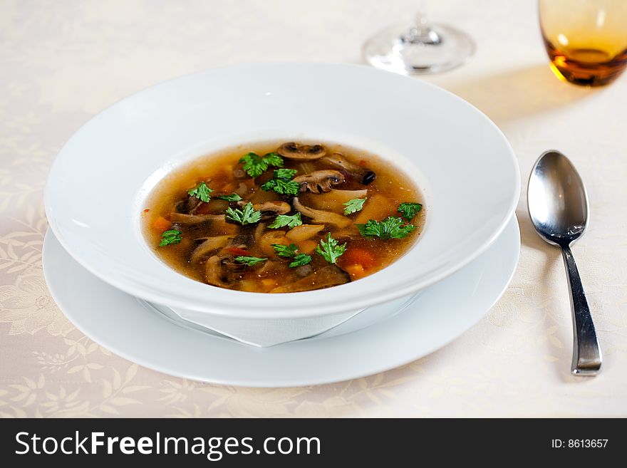 Fresh vegetable soup in ceramic plate