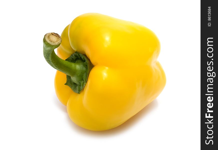 Fresh yellow pepper isolated on white background with shadows