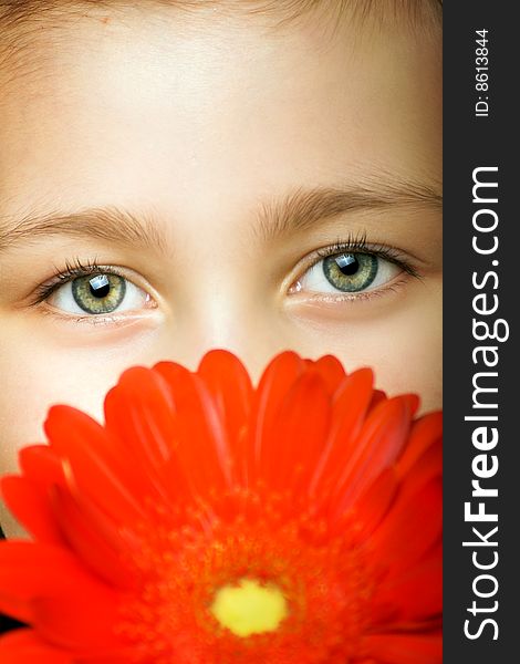 Little Smiling Girl With Flowers