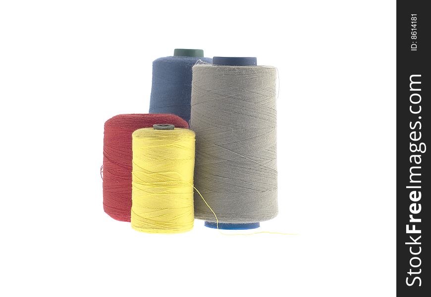 Yellow, red, blue, grey threads isolated on white. Yellow, red, blue, grey threads isolated on white