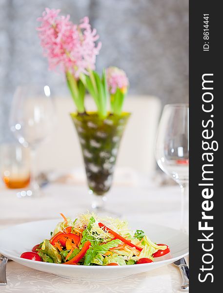 Vegetable salad colorful appetizer dish. Flower