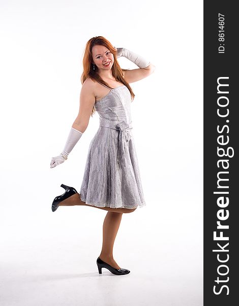 Young girl with white gloves standing on white background. Young girl with white gloves standing on white background