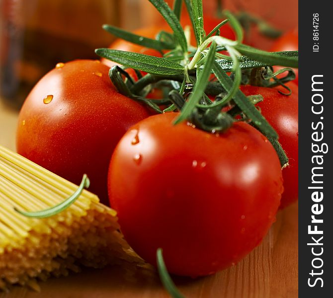 Fresh tomatoes,pasta and rosemary. Fresh tomatoes,pasta and rosemary