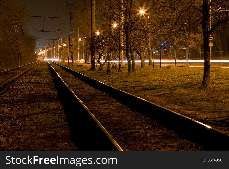 A photo of night railway. A photo of night railway