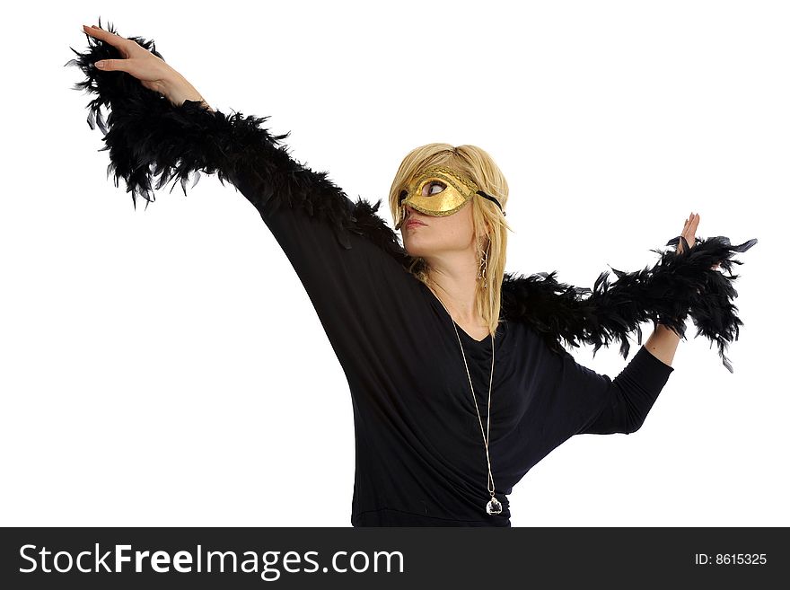 Lovely blond model dancing with golden mask and a black boa, isolated on white. Lovely blond model dancing with golden mask and a black boa, isolated on white