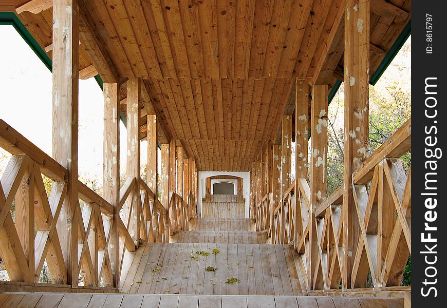 Covered wooden passage from church of prelate St. Nicolas to ravine of The Svyatogorsk Dormition Laura.