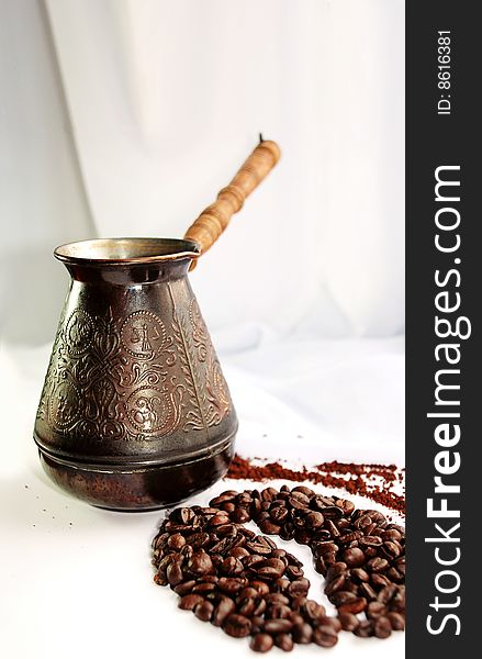 Turkey and grains coffees, laid out as grain of coffee on a light almost white background. An enough place is for your inscriptions. Turkey and grains coffees, laid out as grain of coffee on a light almost white background. An enough place is for your inscriptions