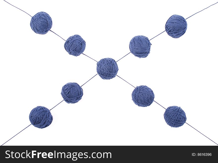 Blue threads and clews  isolated on a white background. Blue threads and clews  isolated on a white background