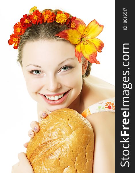Picture of the smiling girl with a great bread