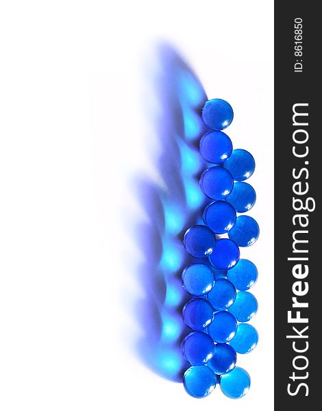 Blue glass beads on a white background