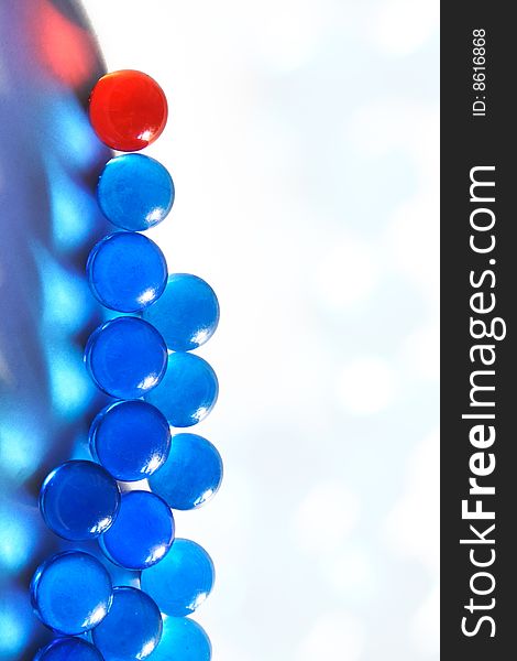 Blue glass beads on a white background