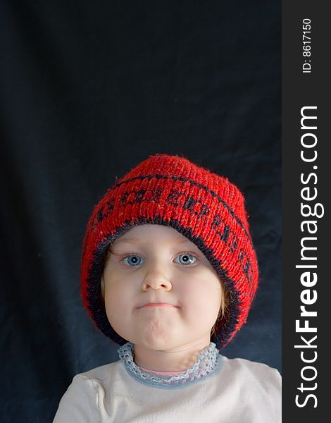 Little girl in  red winter hat. Little girl in  red winter hat