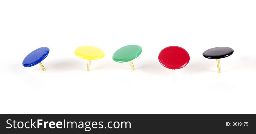 Pins of various colors in line. Pins of various colors in line