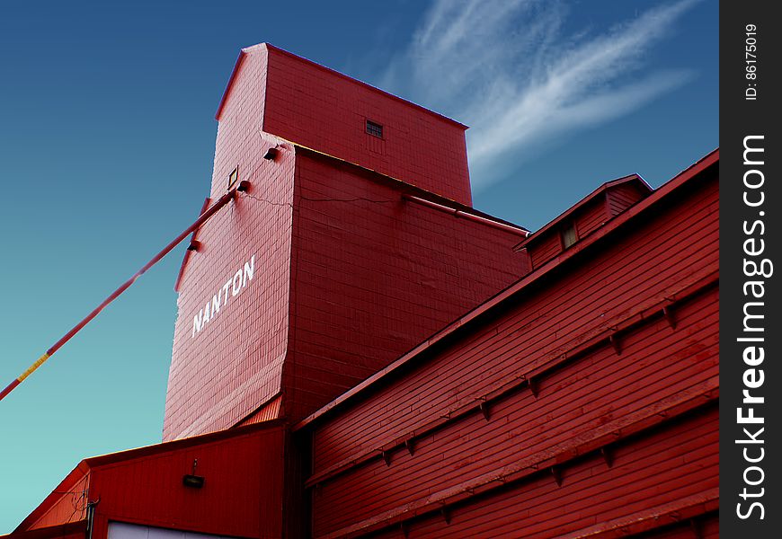 The Canadian Grain Elevator Discovery Centre is a set of restored grain elevators located in Nanton, Alberta, Canada. The centre&#x27;s goal is to preserve examples of old grain elevators to educate visitors about the town&#x27;s, and Alberta&#x27;s, agricultural history. In 2001 the last of Nanton’s grain elevator row was threatened by demolition because of recent abandonment of the Canadian Pacific Railway that the elevators stood next to. Many worried citizens in and around the town of Nanton had realized that a part of the town&#x27;s and province&#x27;s history was about to be torn down and lost forever. The Canadian Grain Elevator Discovery Centre is a set of restored grain elevators located in Nanton, Alberta, Canada. The centre&#x27;s goal is to preserve examples of old grain elevators to educate visitors about the town&#x27;s, and Alberta&#x27;s, agricultural history. In 2001 the last of Nanton’s grain elevator row was threatened by demolition because of recent abandonment of the Canadian Pacific Railway that the elevators stood next to. Many worried citizens in and around the town of Nanton had realized that a part of the town&#x27;s and province&#x27;s history was about to be torn down and lost forever.