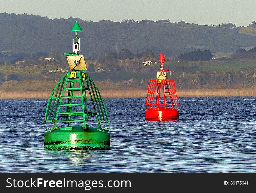 Channel Markers These show well-established channels and indicate port &#x28;left&#x29; and starboard &#x28;right&#x29; sides of the channels. Port marks A red can shape. At night, a red flashing light may be shown. Starboard mark A green conical shape. At night a green flashing light maybe shown. Coming In Rule When entering harbour &#x28;up stream&#x29; the red port mark should be kept on the boat&#x27;s port &#x28;left&#x29; side the green mark on the boat&#x27;s starboard &#x28;right&#x29; side. Going Out Rule When leaving harbour &#x28;down stream&#x29; the red port mark should be kept on the boat&#x27;s starboard &#x28;right&#x29; side and the green mark on the boat&#x27;s port &#x28;left&#x29; side. Channel Markers These show well-established channels and indicate port &#x28;left&#x29; and starboard &#x28;right&#x29; sides of the channels. Port marks A red can shape. At night, a red flashing light may be shown. Starboard mark A green conical shape. At night a green flashing light maybe shown. Coming In Rule When entering harbour &#x28;up stream&#x29; the red port mark should be kept on the boat&#x27;s port &#x28;left&#x29; side the green mark on the boat&#x27;s starboard &#x28;right&#x29; side. Going Out Rule When leaving harbour &#x28;down stream&#x29; the red port mark should be kept on the boat&#x27;s starboard &#x28;right&#x29; side and the green mark on the boat&#x27;s port &#x28;left&#x29; side.