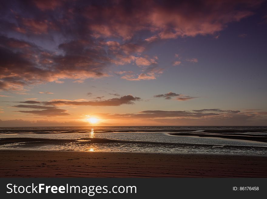 Here is a sunset photograph taken from the beach in Blackpool. Located in Blackpool, Lancashire, England, UK. Here is a sunset photograph taken from the beach in Blackpool. Located in Blackpool, Lancashire, England, UK.