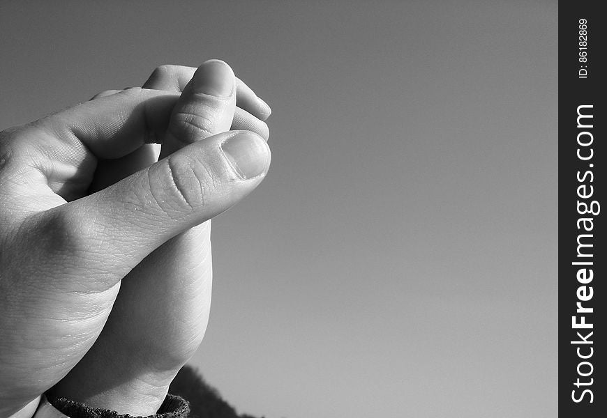 Grayscale Photography of Human Hand Holding Hands