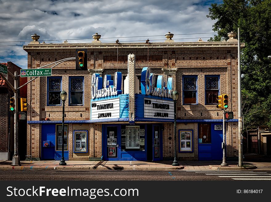 Exterior and marquee of Bluebird movie theater on Colfax Street in Denver, Colorado on sunny day. Exterior and marquee of Bluebird movie theater on Colfax Street in Denver, Colorado on sunny day.