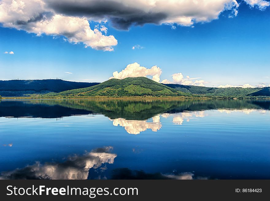 Clouds Reflecting On Blue Lake