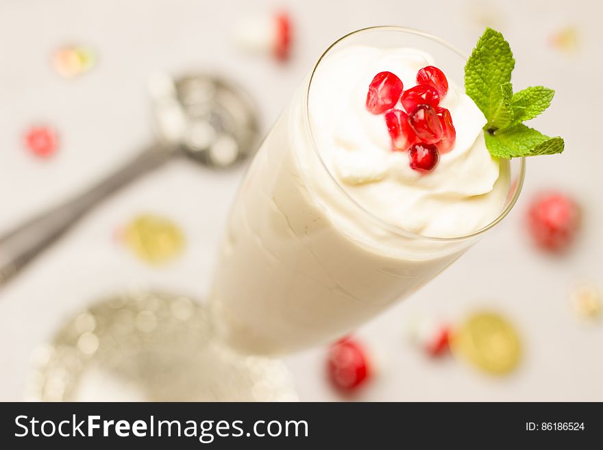Delicious yogurt topped with cherries