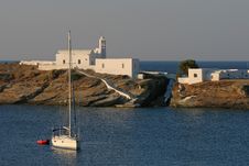 Seascape With The Boat And Greek Architecture Stock Photos